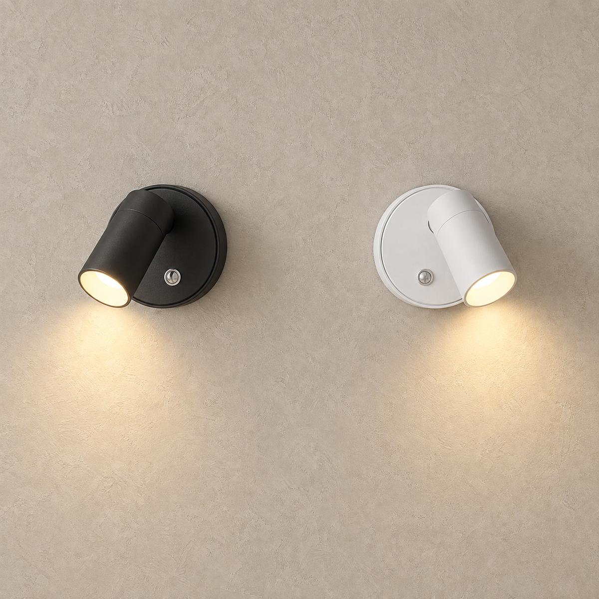 Nocarel cordless wall lamps in black and white glowing side by side on a plain plaster wall