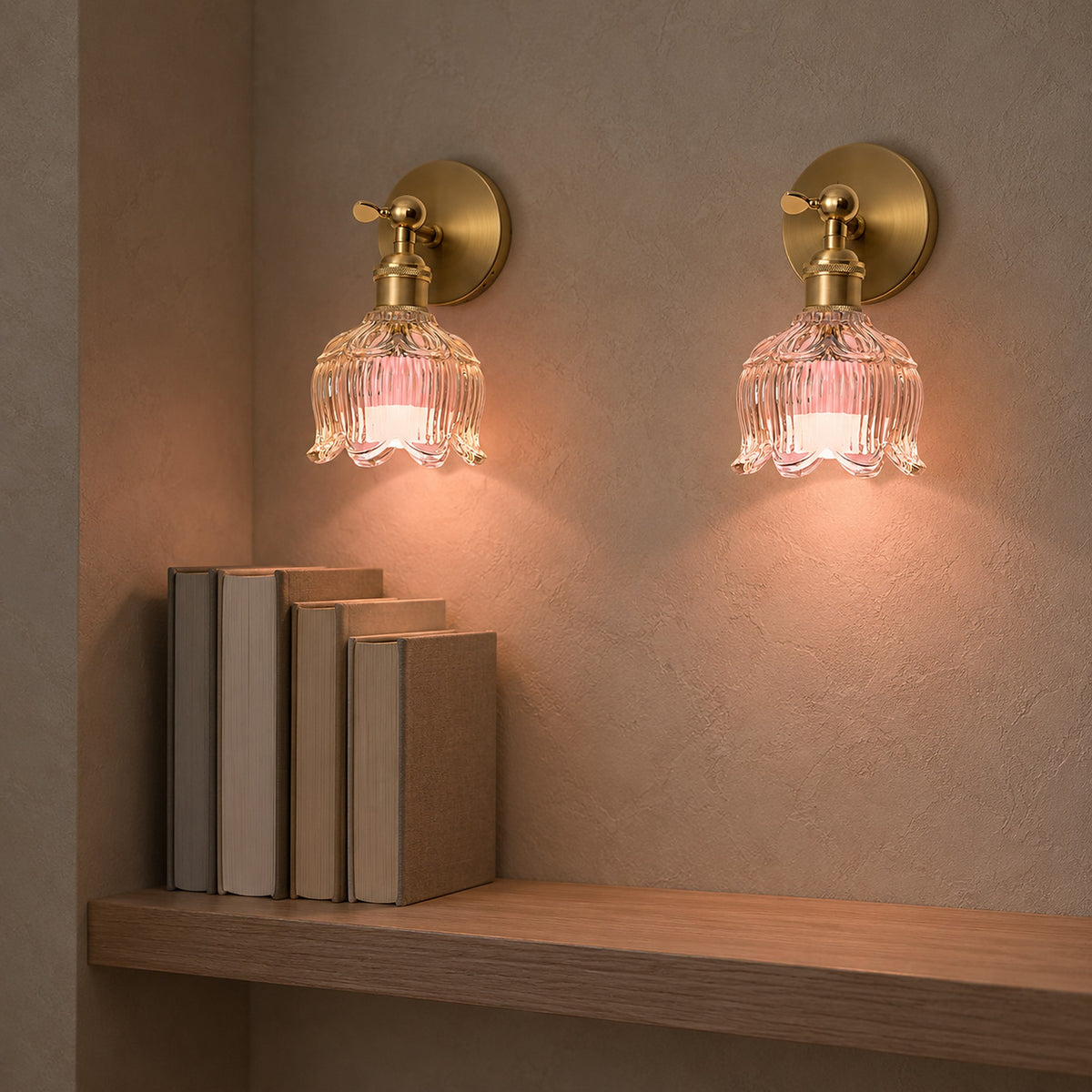 Pair of Nolavire golden rechargeable wall sconces glowing a rose color in a library nook corner