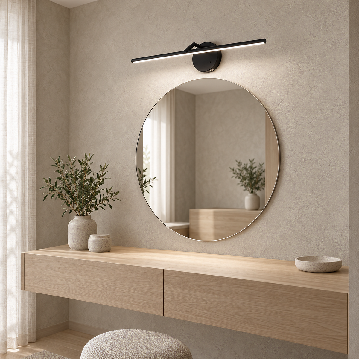 Nolesira black wireless wall light over a dressing mirror set to a cooler white tone #color_black