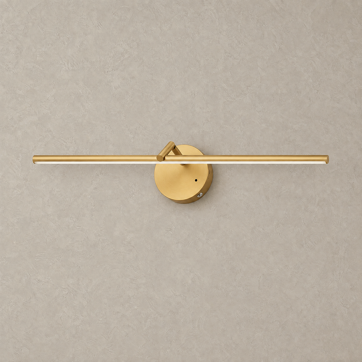 Nolesira gold rechargeable wall sconce with a brushed finish, switched off on plaster #color_gold