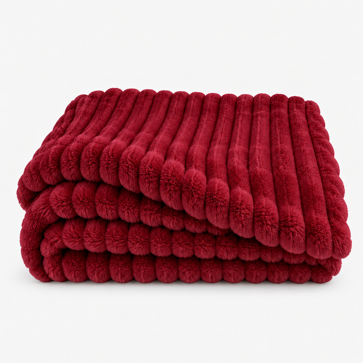 Pasorel ribbed plush fleece blanket in wine red, folded on a plain studio backdrop #color_wine red