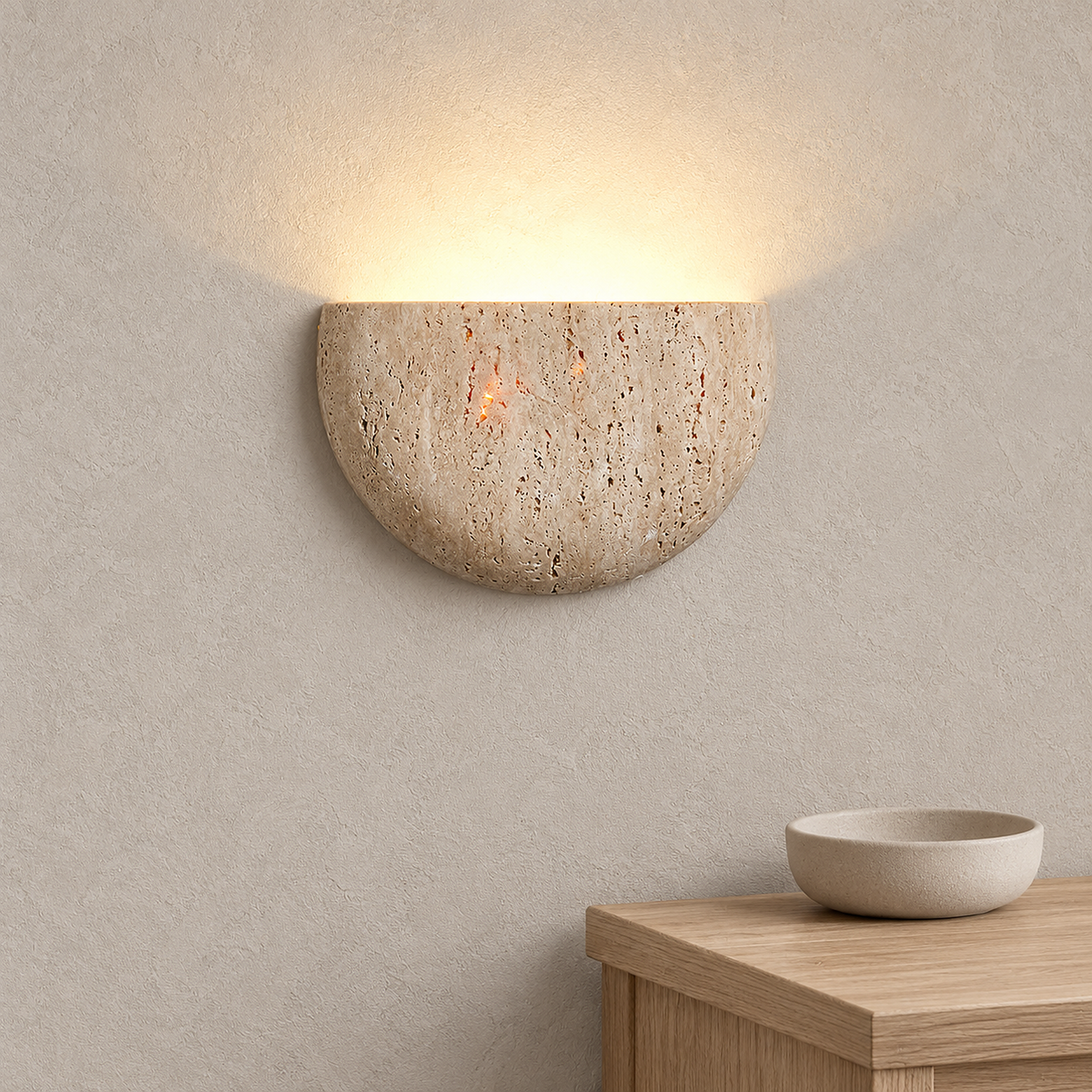 Pavolen stone wall lamp glowing warm in a quiet entryway corner by day