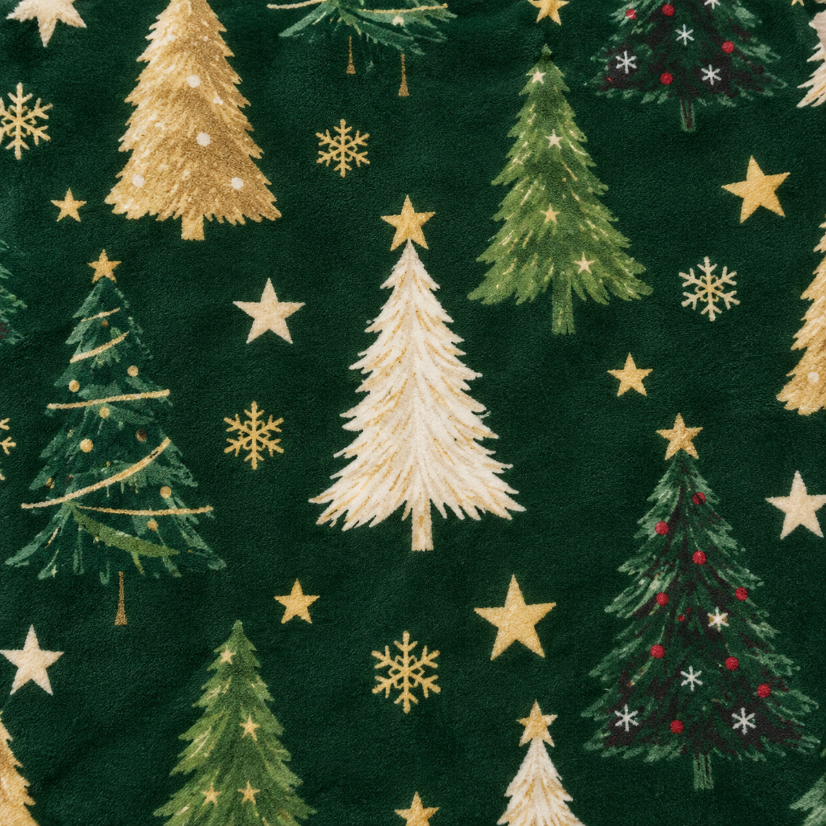 Ravisel dark green and cream plush throw blanket, close view of printed cream trees and stars