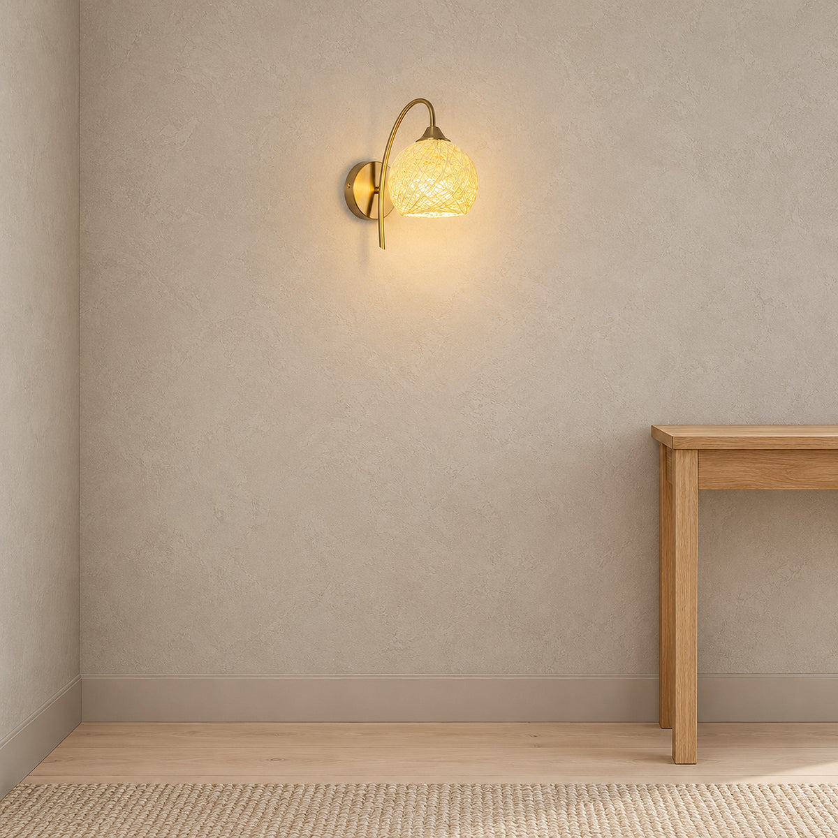 Remilvo gold wall sconce lit on a clear hallway wall during the day
