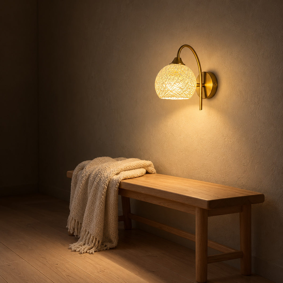 Remilvo gold wireless wall light casting warm white light across a stair landing at night