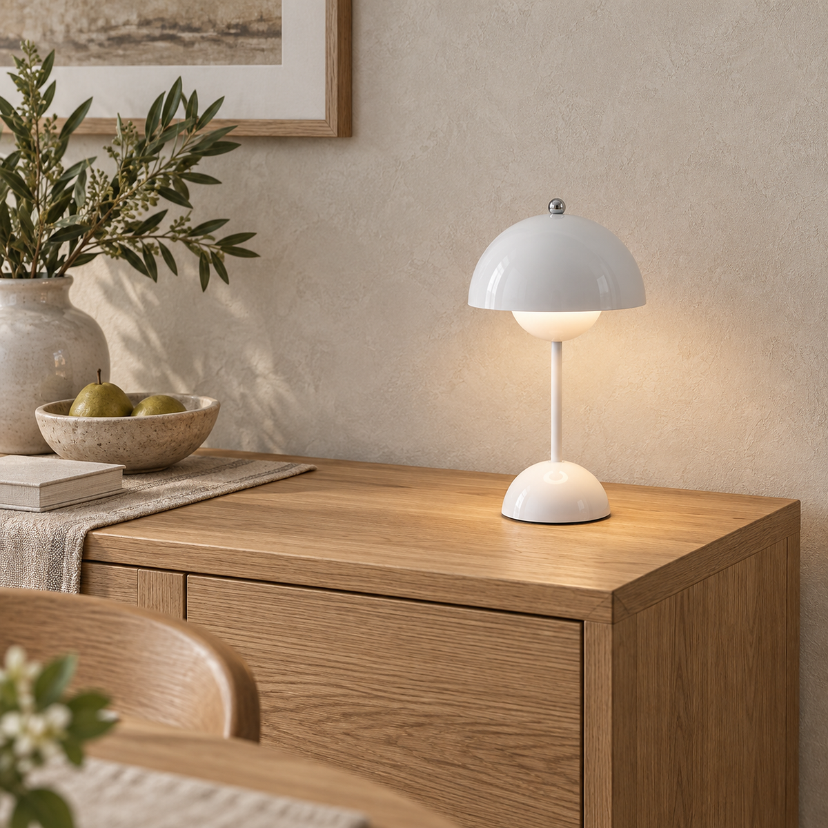 Retomira white battery operated table lamp leaving space free on a dining sideboard