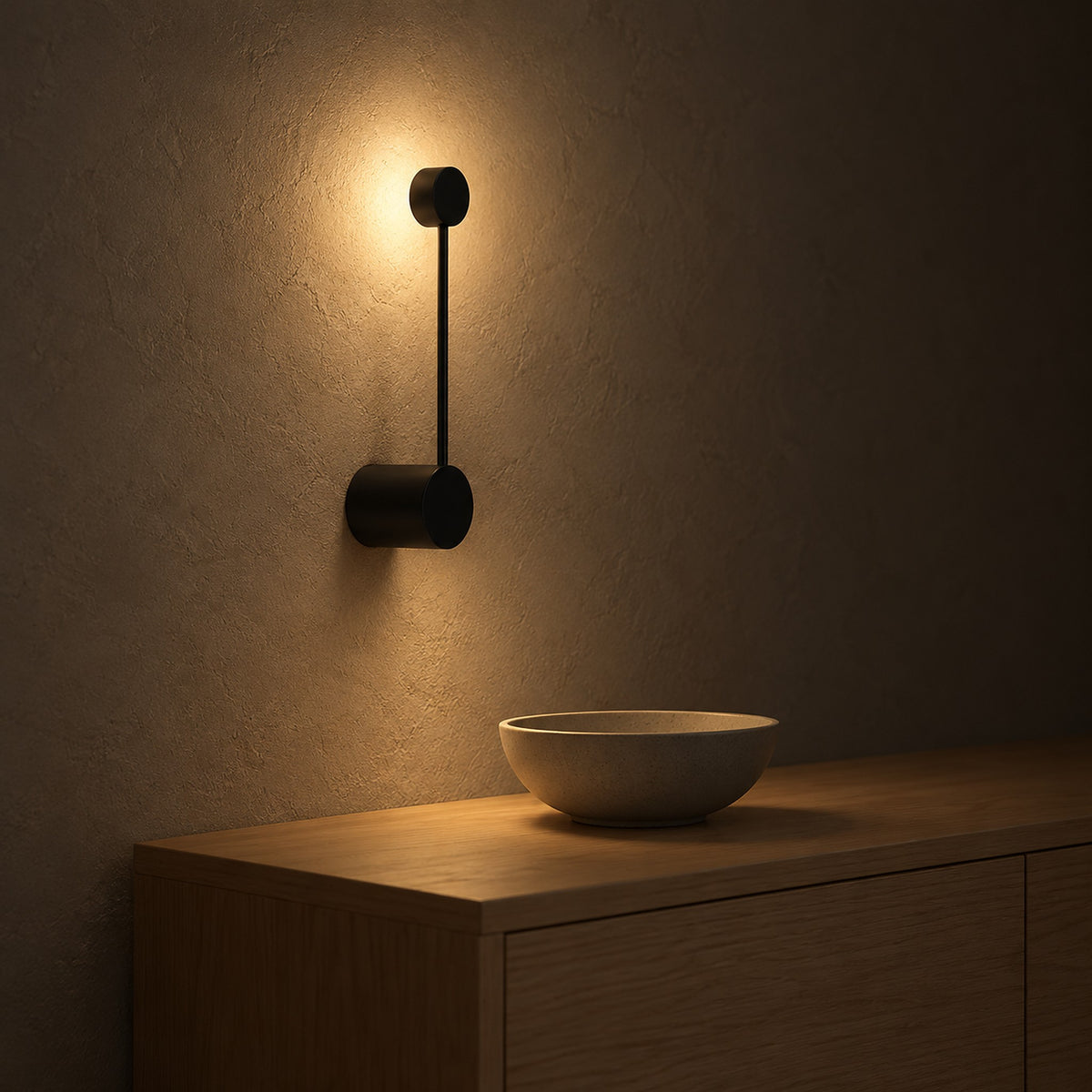Rilameo black wall sconce glowing warm above a dining sideboard at night