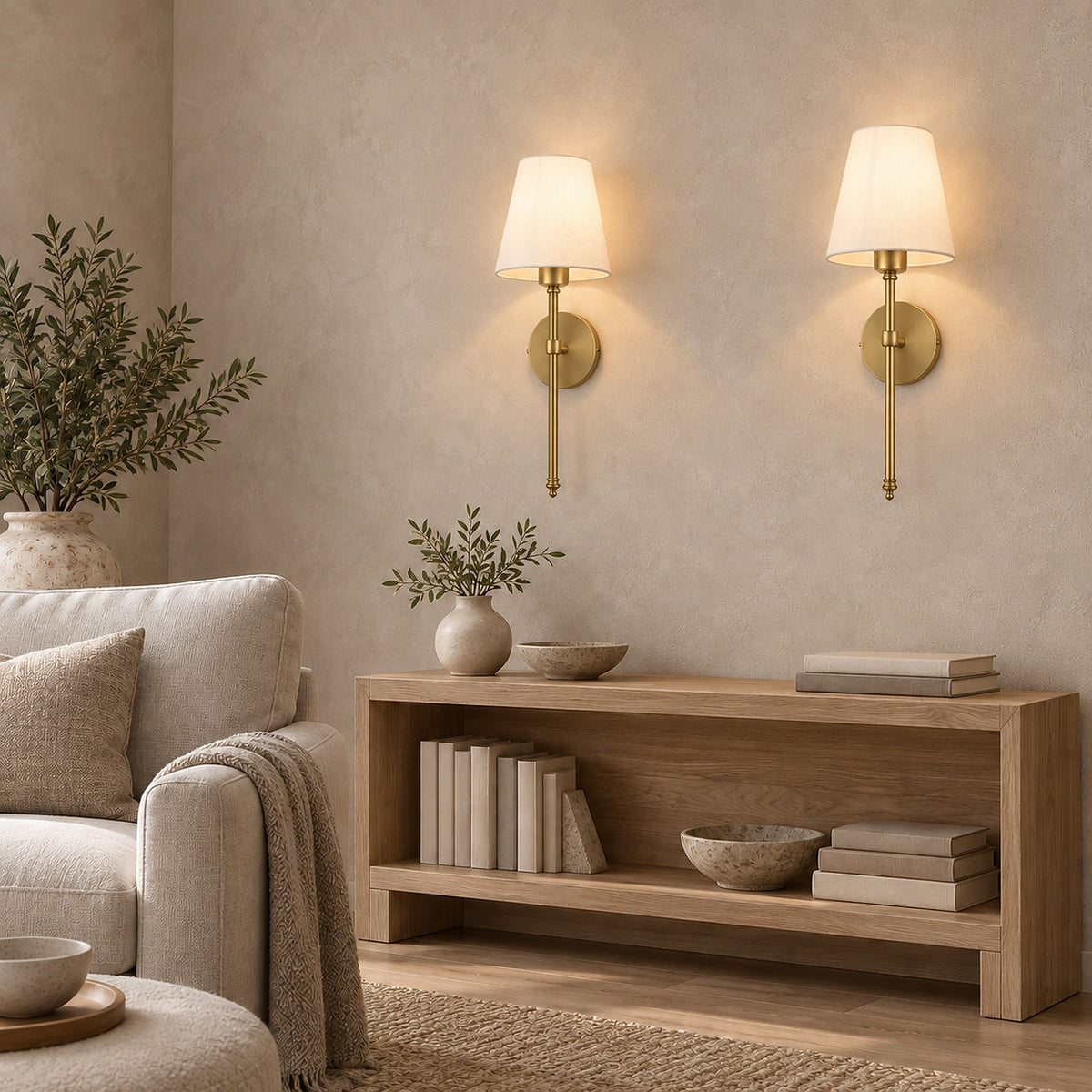 Rimavio gold wireless wall light pair glowing above a living room shelf #color_gold