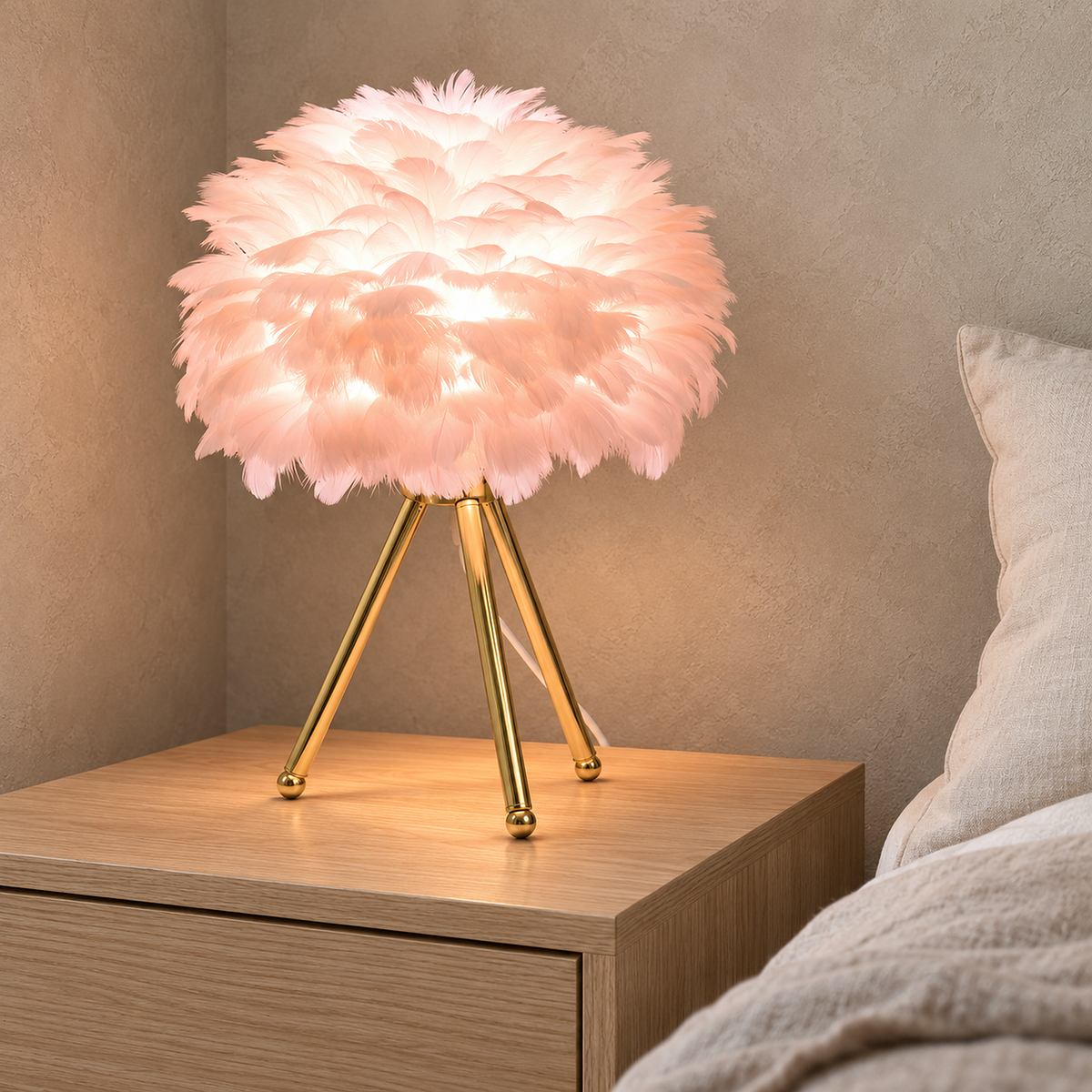 Rimolen light pink gold bedside lamp glowing beside the bed in a guest sleeping alcove by day