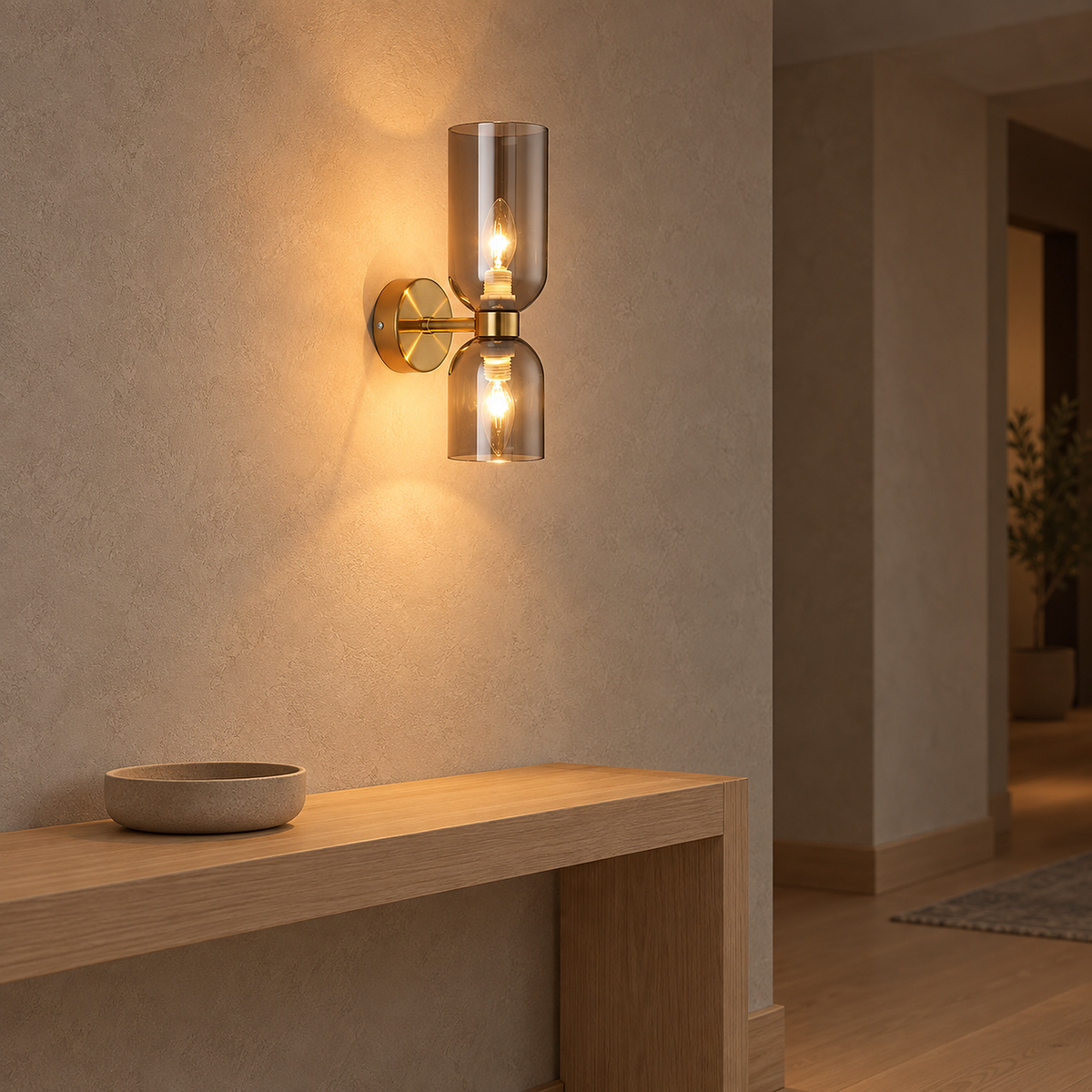 Riselona gold and smoke gray glass wall sconce spreading warm light across an entryway #color_gold & smoke gray glass