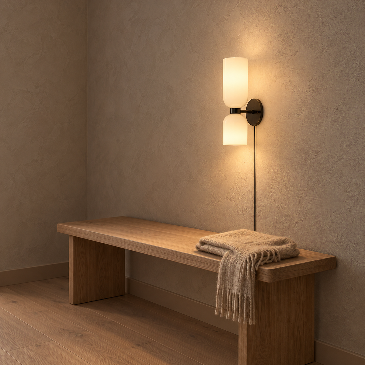 Riselona matte black and opal glass wall light casting warm light on an entryway wall #color_matte black & opal glass
