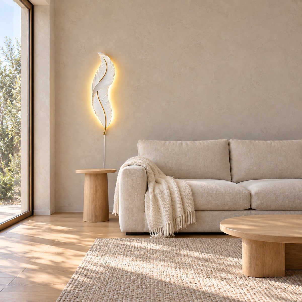 Riselvo white plug in wall lamp lit beside an oatmeal sofa in a bright living room