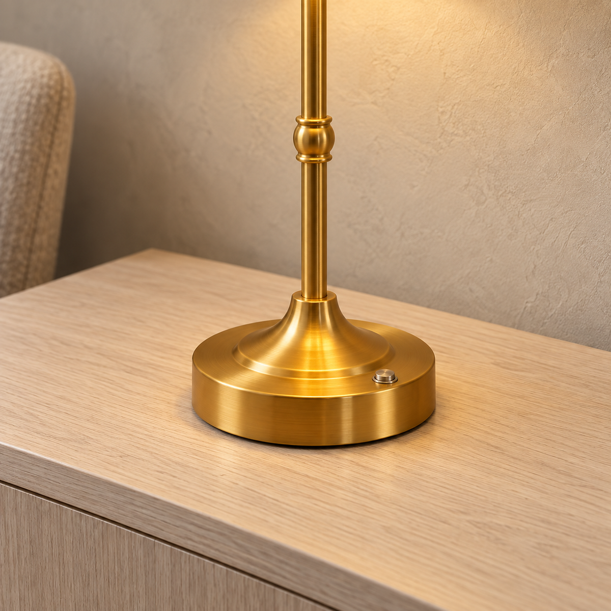 Sanovire gold and white table lamp with brushed gold base and small round button