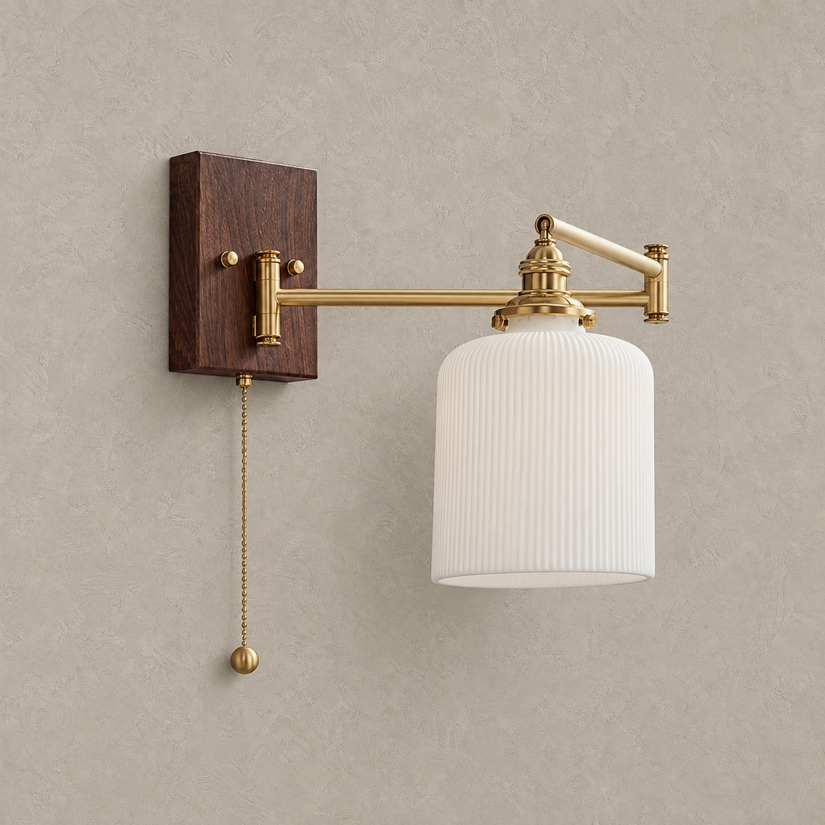 Selanvo gold and white swing arm wall sconce shown unlit with its white ceramic shade and rectangular backplate