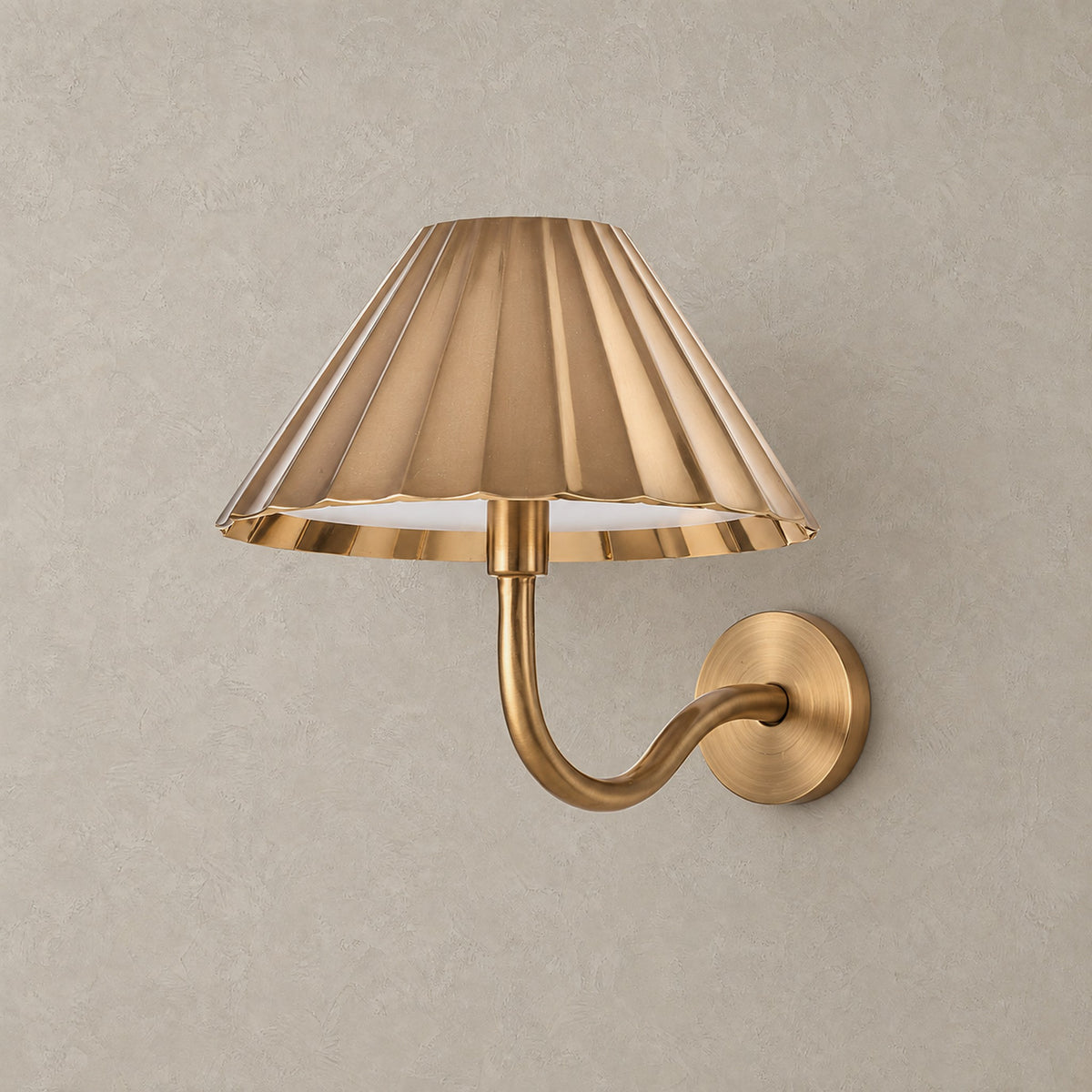 Selorna gold rechargeable wall sconce with a dome shade, unlit on plain plaster