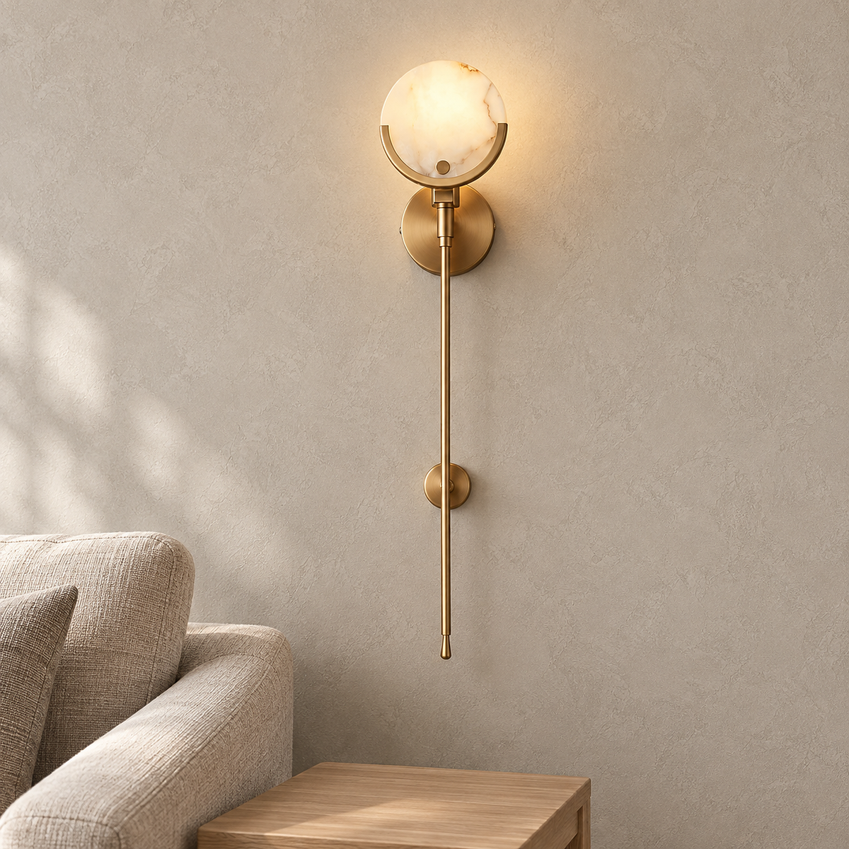 Serrinte brass wall sconce lit in daylight in an upstairs snug, whole fixture in view