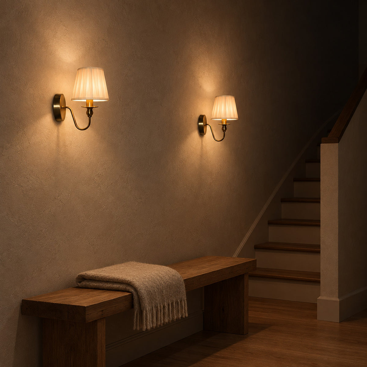 Siralto gold battery operated wall sconce pair lighting a stair landing at night