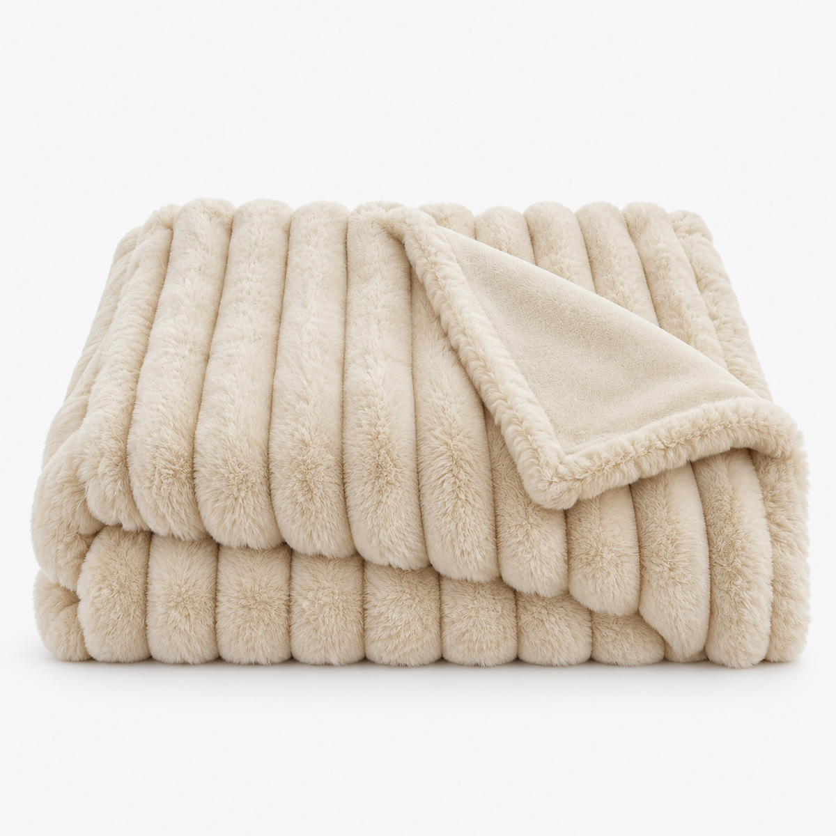 Sorelvi beige faux fur throw blanket loosely folded on white, showing its raised striped ribs