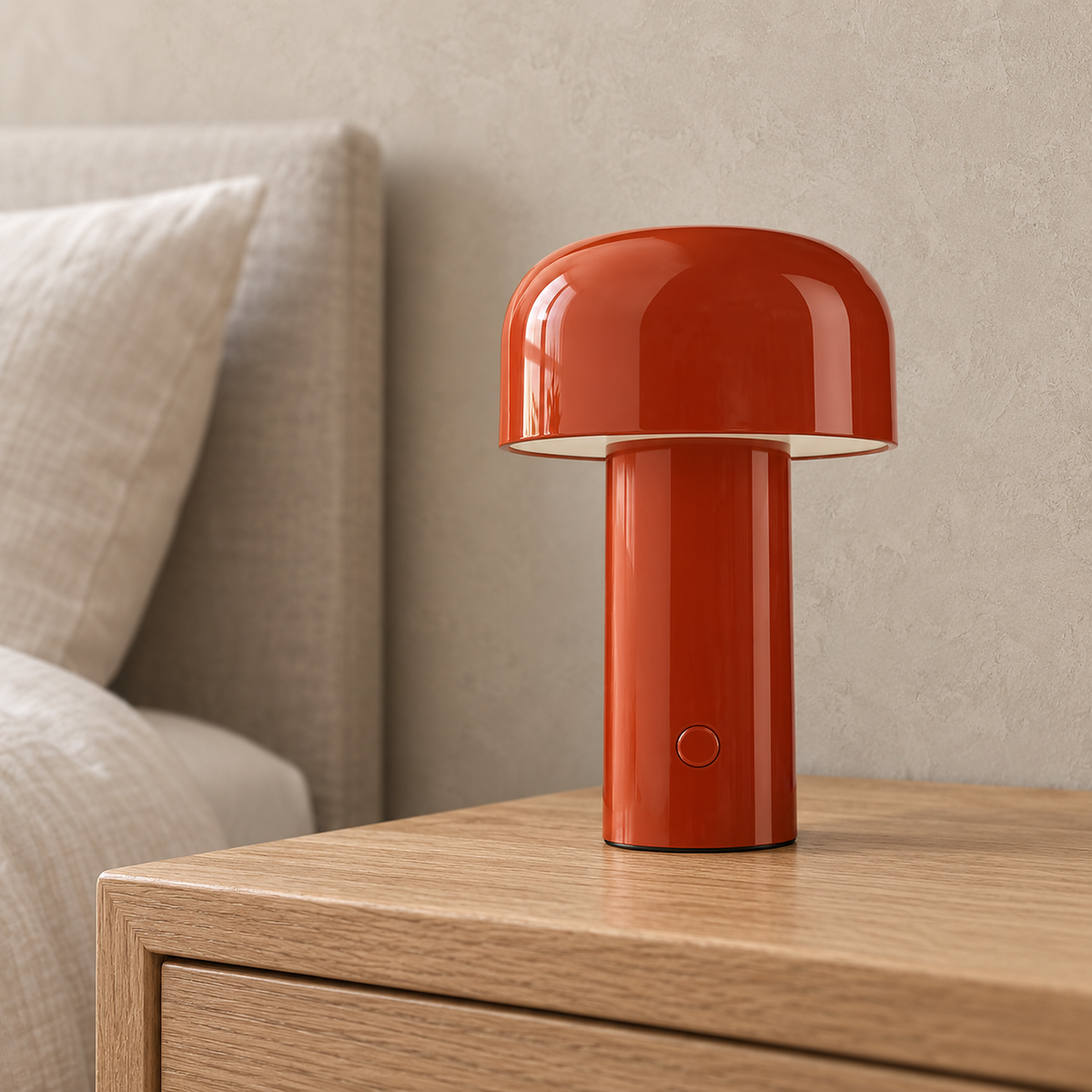 Sorimel red portable table lamp in close view showing the rounded cap and shiny finish in daylight