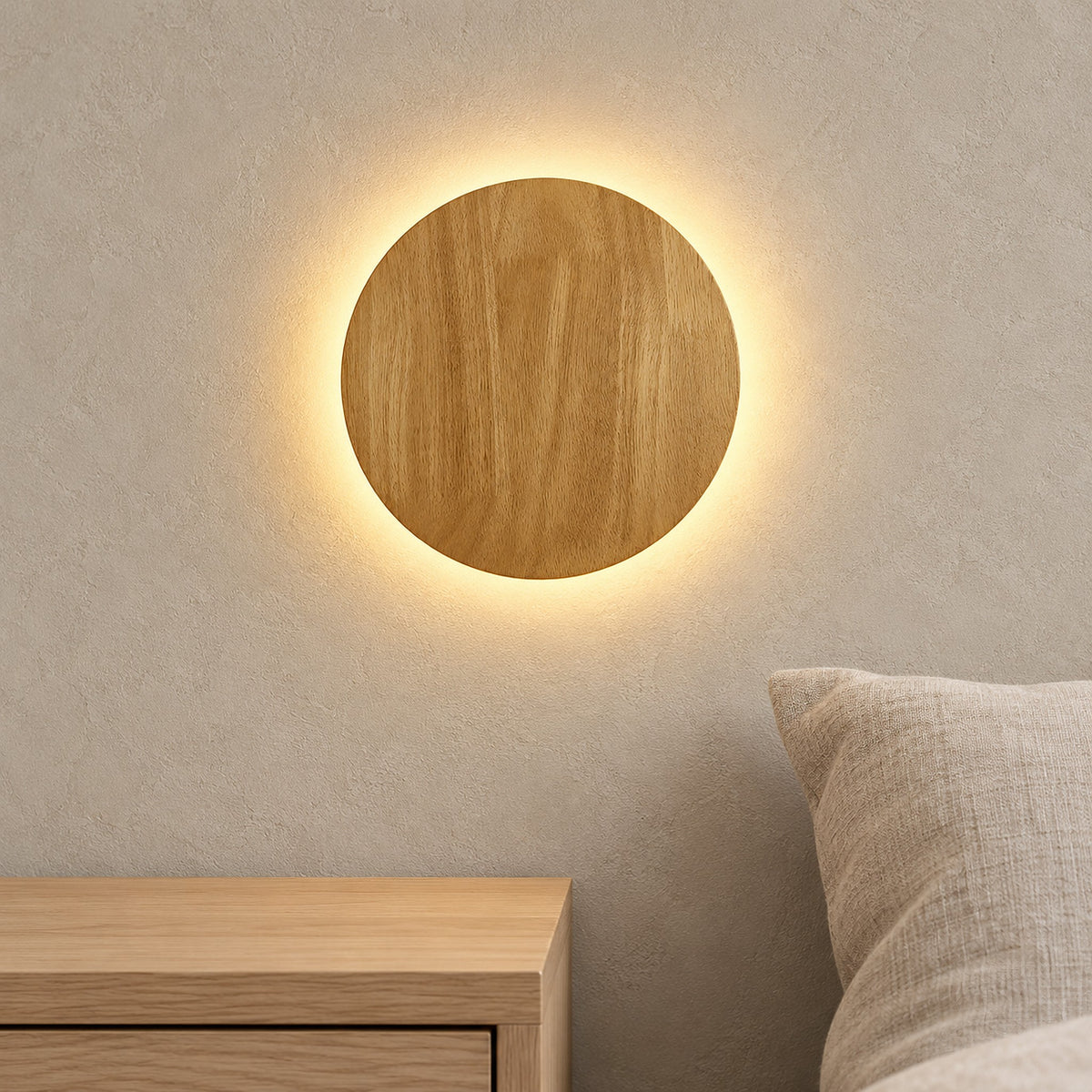 Sorivan light brown bedside wall light glowing above a clear bedside table in a guest bedroom
