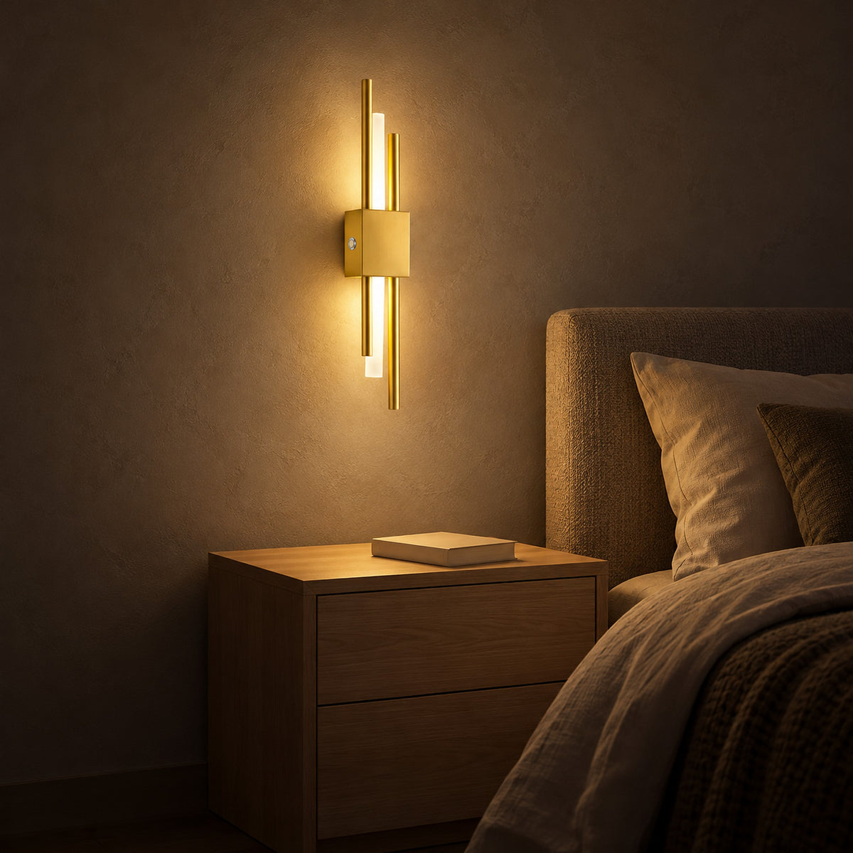 Sorlimo gold and white bedside wall light casting a warm glow across bedroom plaster at night