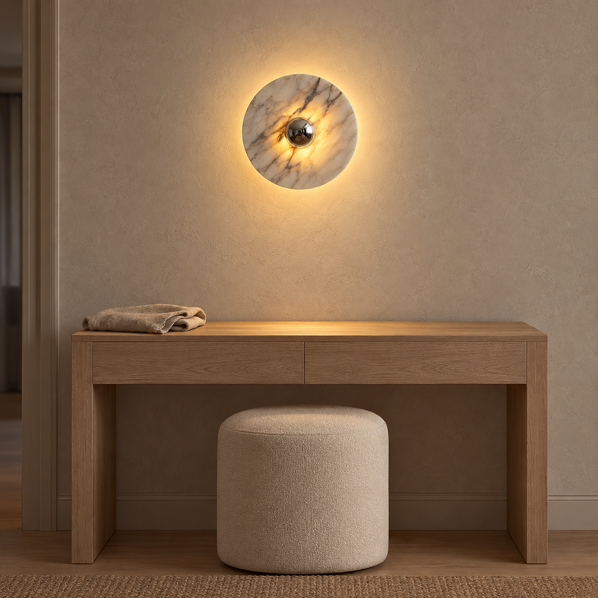 Talemio chrome LED wall sconce in the large size glowing above a dressing room surface