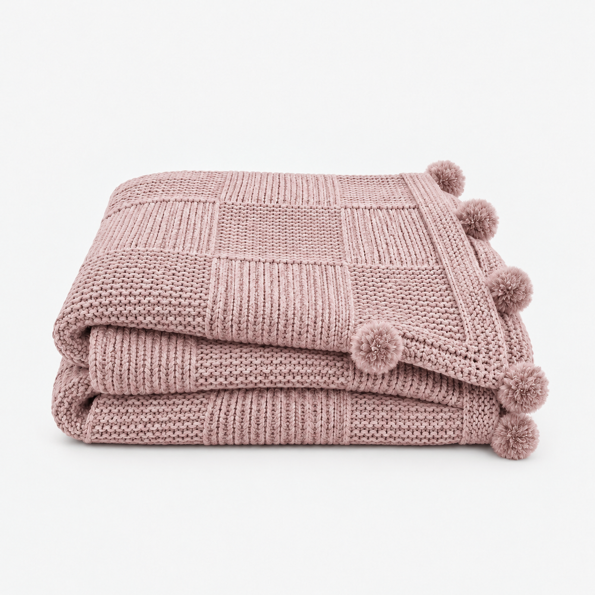 Talenvo throw blanket in pink, loosely folded with fuzzy pom poms on a plain background #color_pink