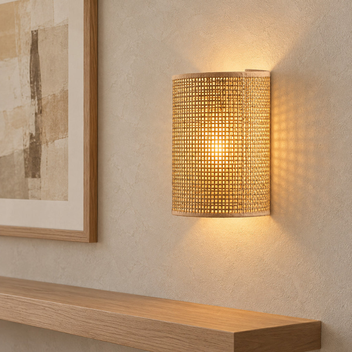 Talmevi light tan plug in wall light with an illuminated weave beside artwork on a landing