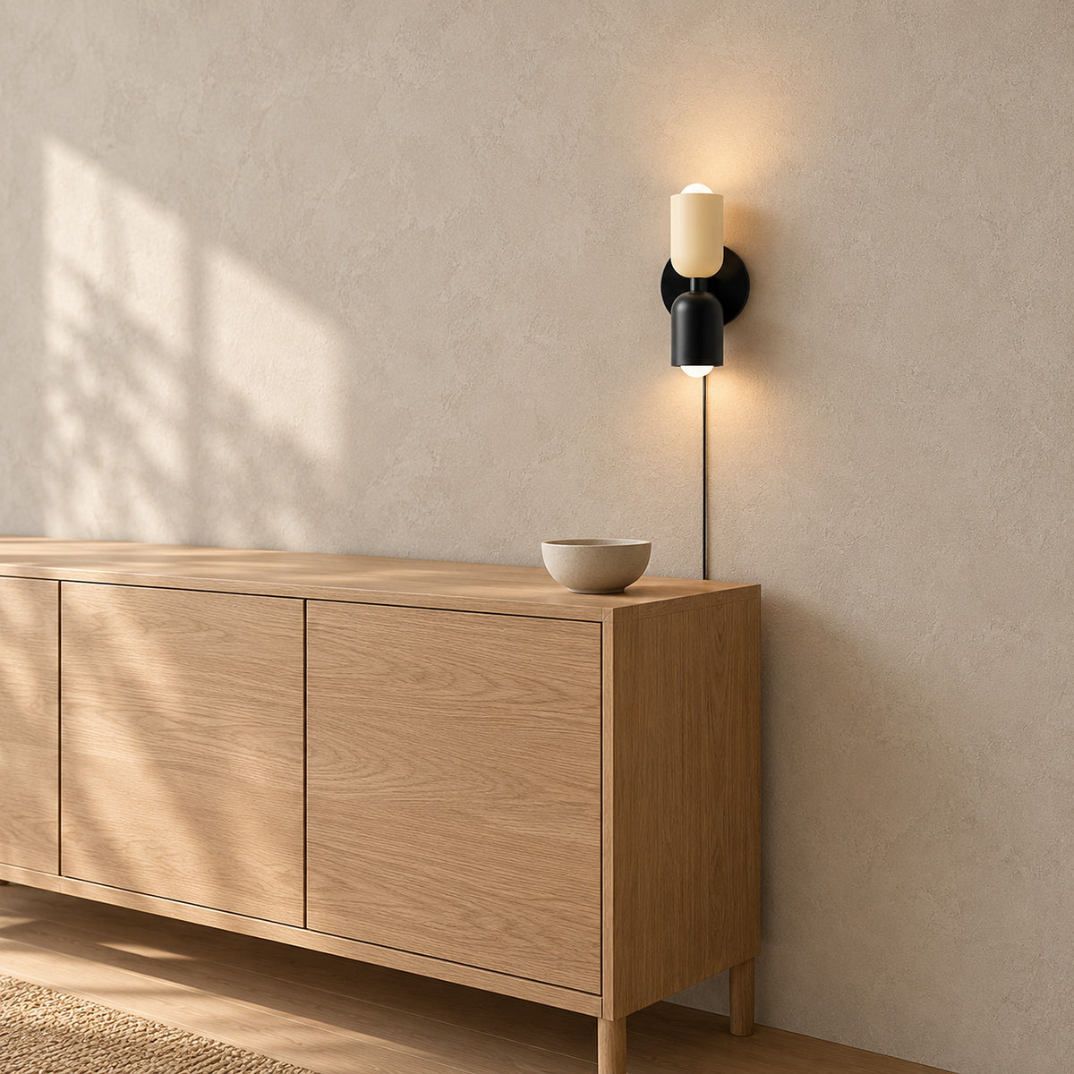 Talomi beige and black plug in wall lamp above the corner of a dining sideboard #color_beige & black