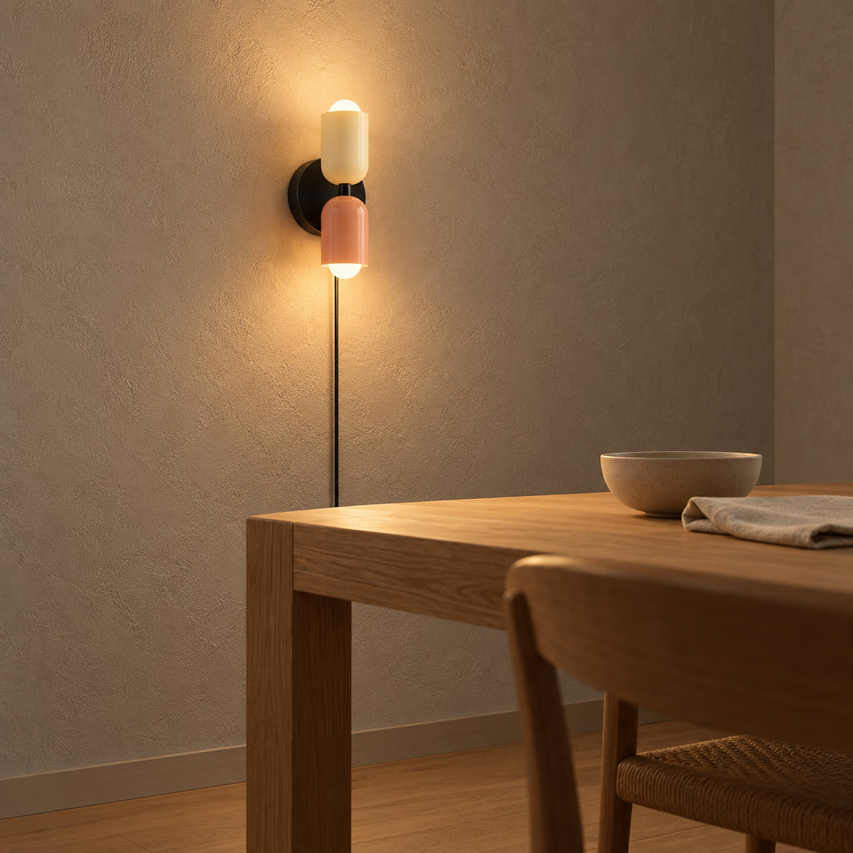 Talomi beige and pink wall lamp warming a dining place setting in afternoon light #color_beige & pink