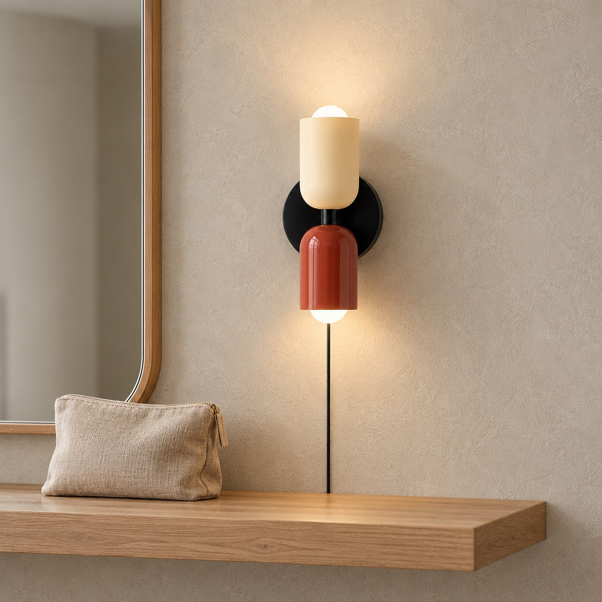 Talomi beige and red bedside wall light glowing beside the edge of a dressing mirror #color_beige & red