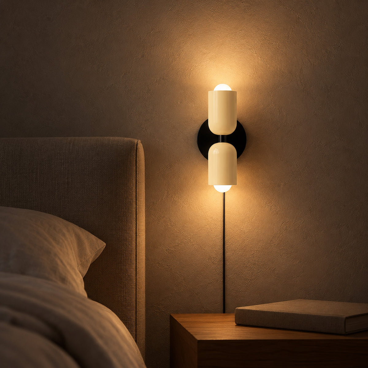 Talomi beige bedside wall light casting light above and below beside a bedroom headboard