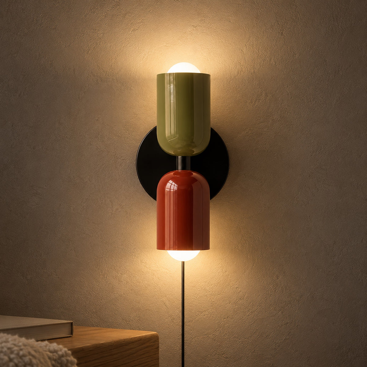 Talomi green and red wall lamp casting warm light above and below in a hallway at night #color_green & red