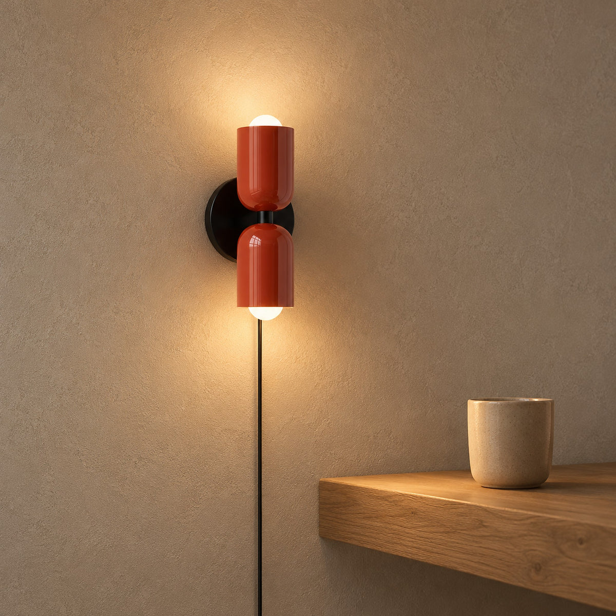 Talomi red plug in wall lamp warming a stair landing ledge with light up and down #color_red