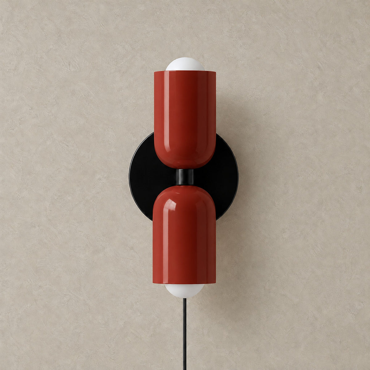 Talomi red wall lamp unlit on a plain backdrop showing its single color metal finish #color_red