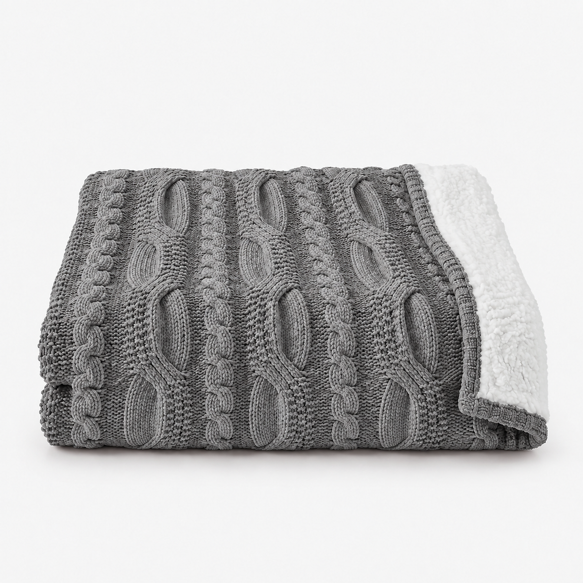 Tarivel gray plush throw blanket loosely folded on white with a cable knit chenille front #color_gray