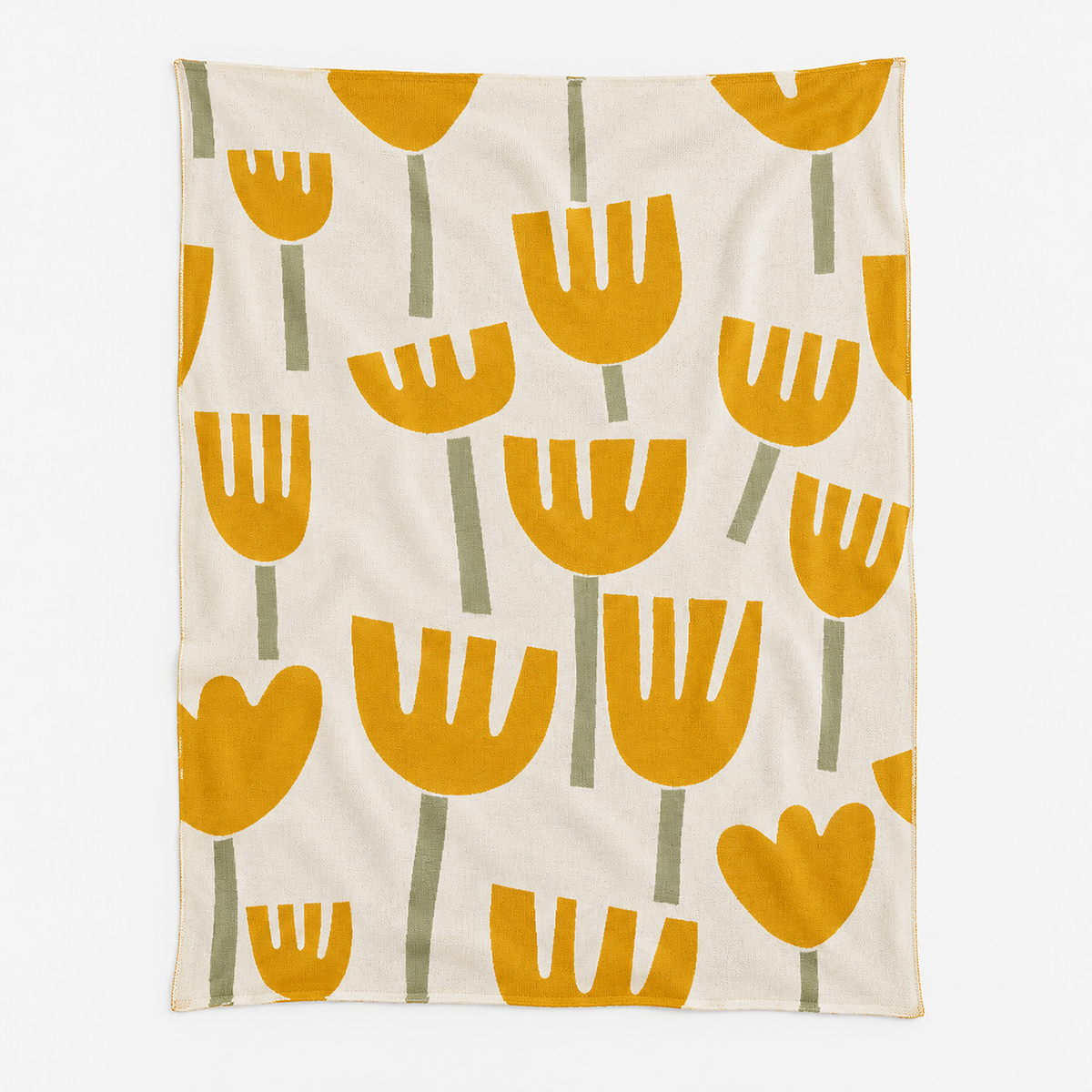 Taroveli cotton knit throw blanket in cream with a full yellow floral design laid open