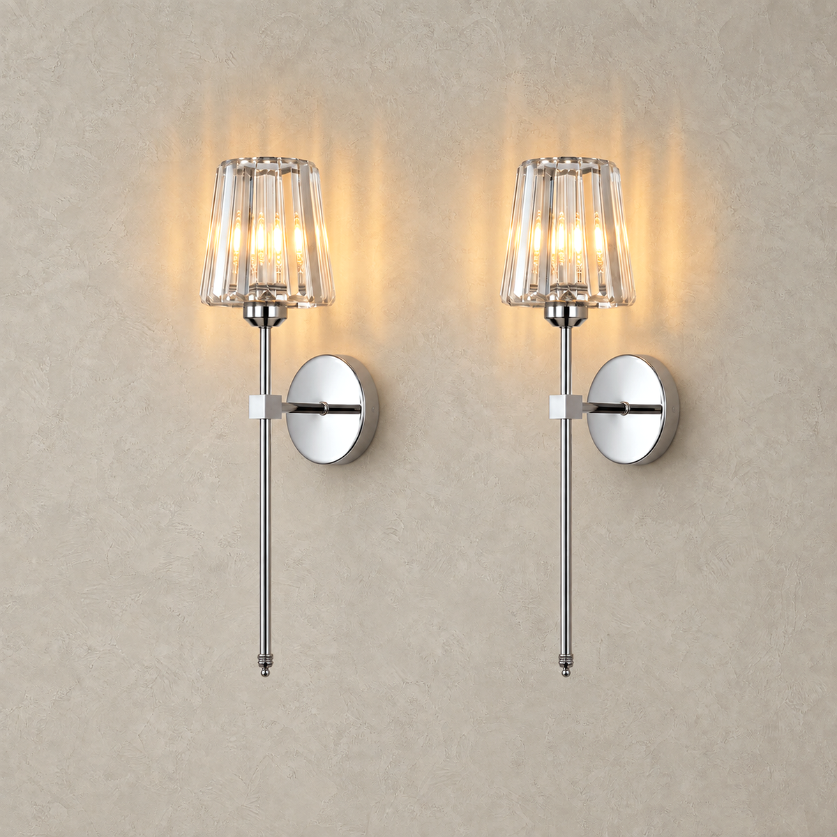 Tavirelo silver wireless wall lights shown as a lit set of two on plain plaster #color_silver