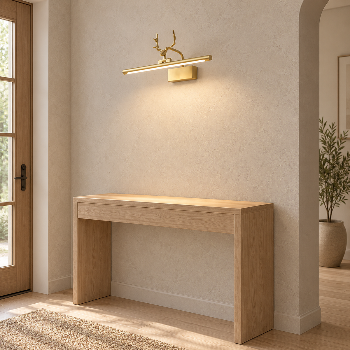Tavorni gold plug in wall light lit with its canopy seated flat against plaster