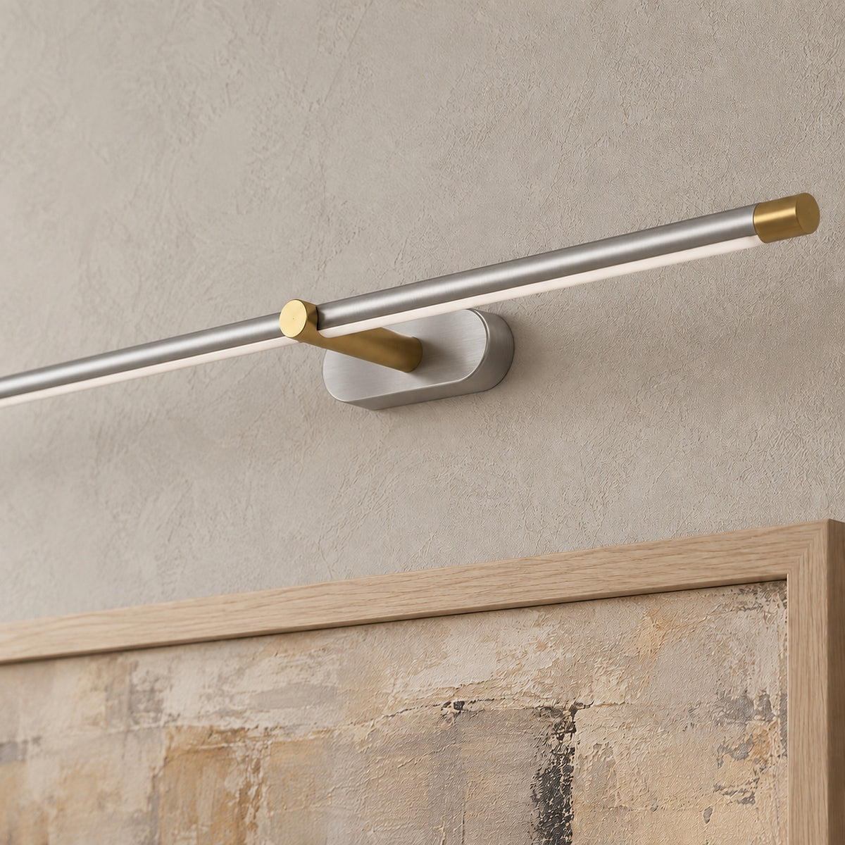 Telavvo nickel & gold led wall sconce close up of the gold arm, end cap and light strip #color_nickel & gold