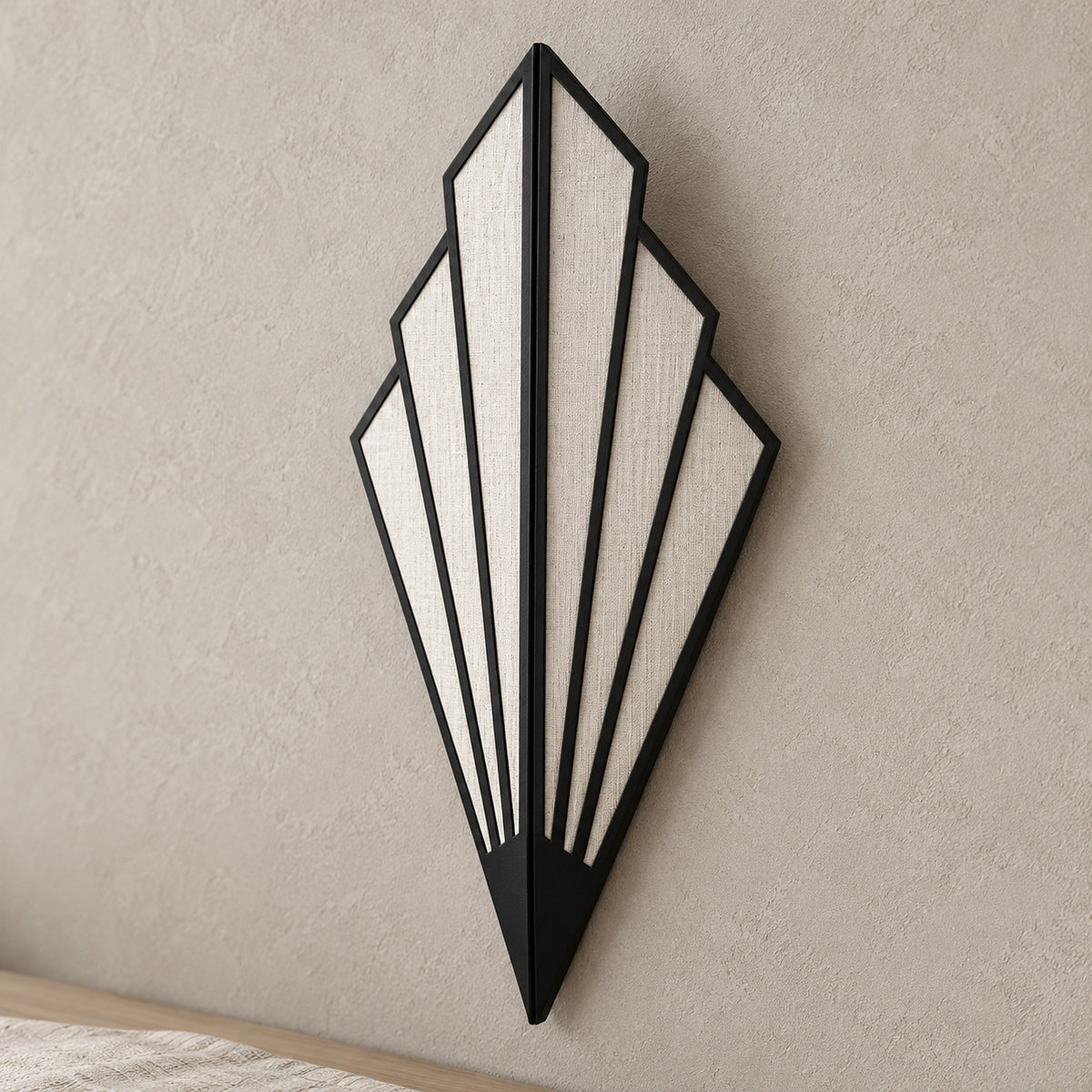 Ticorena black plug in wall light closeup of the metal ribs and textured panels
