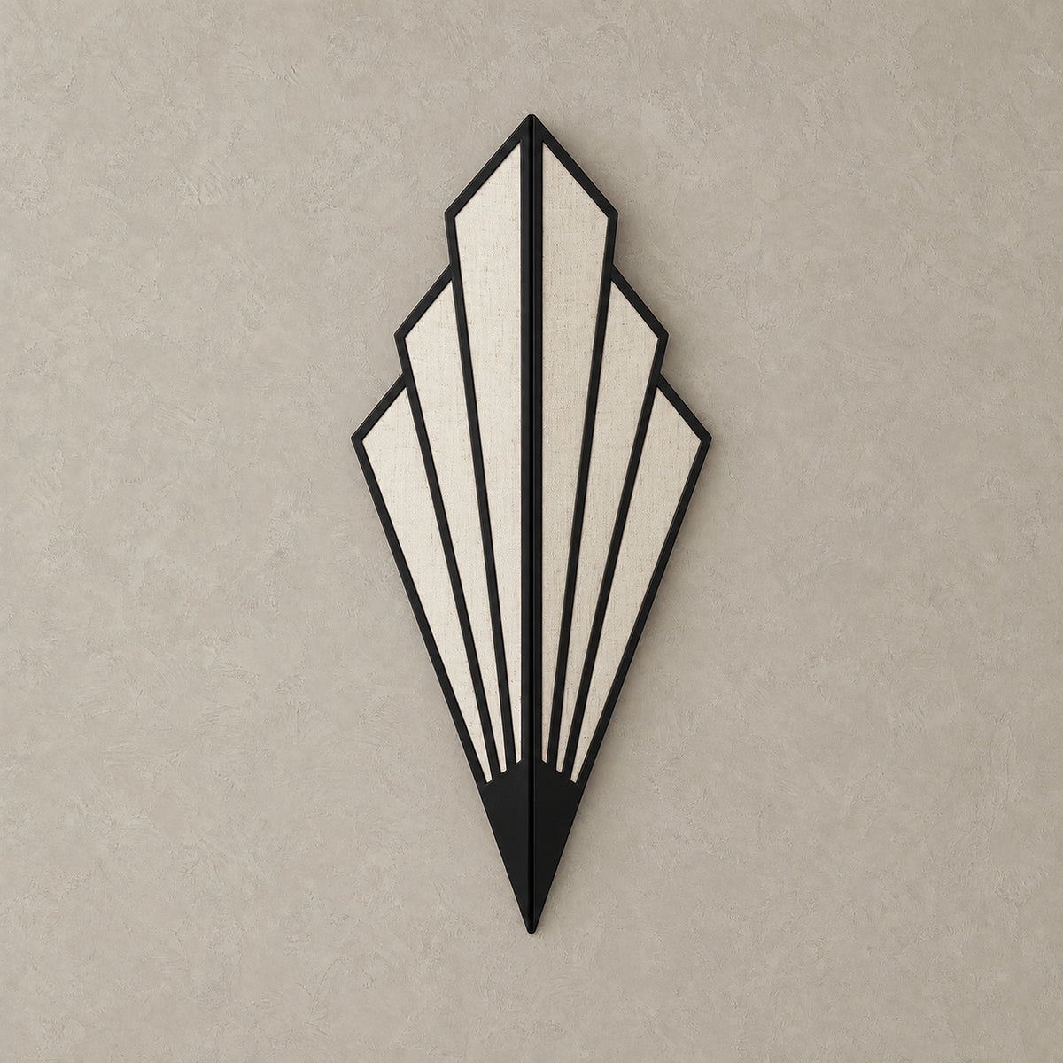 Ticorena black plug in wall sconce shown unlit against a plain plaster wall