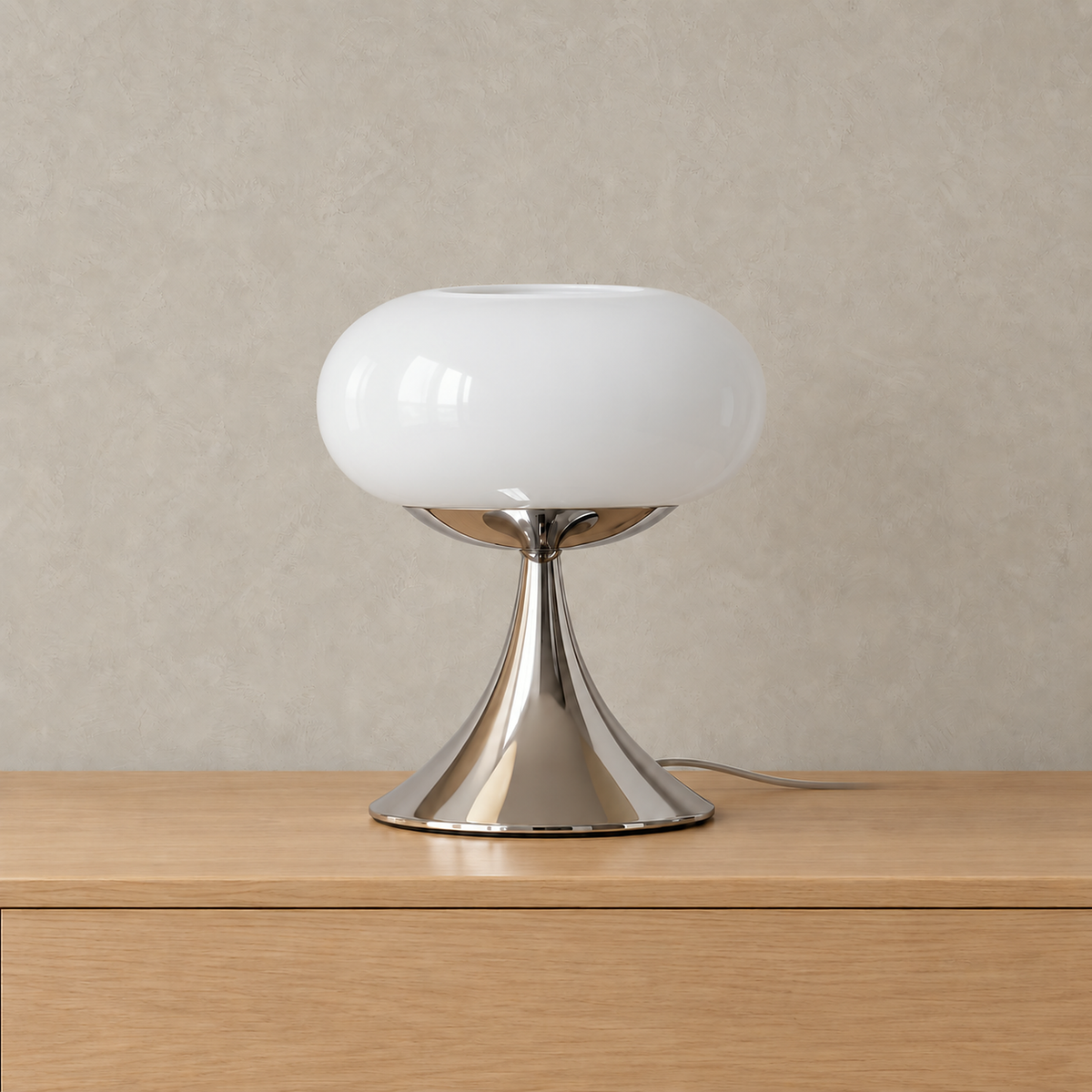 Tilvara stained glass table lamp in white, unlit on a pale surface showing its metal stem #color_white