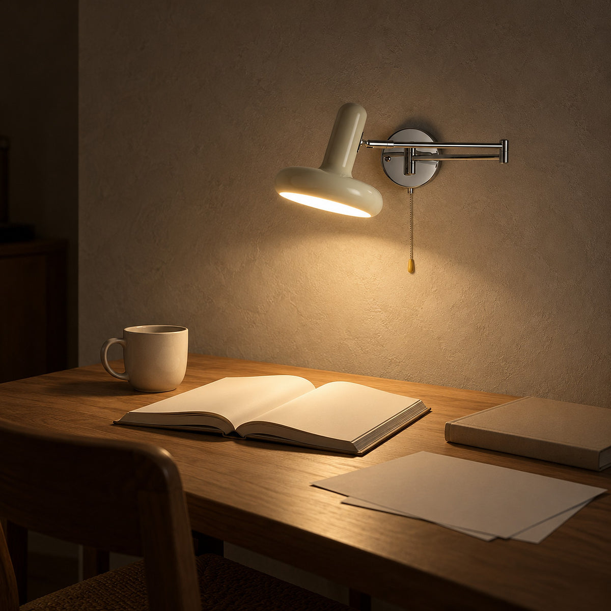 Tivenola cream hardwired wall light illuminating evening reading at a writing desk
