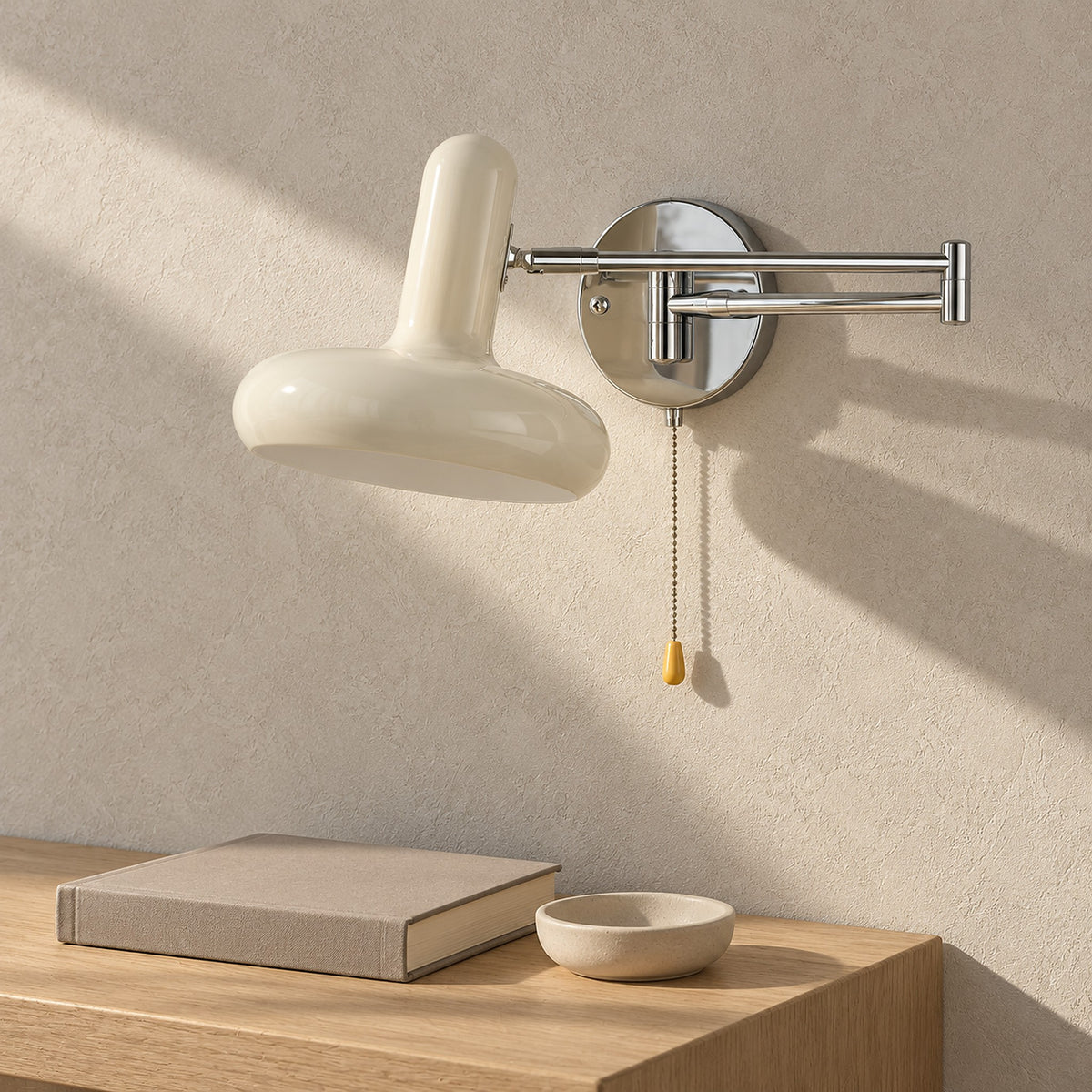 Tivenola cream hardwired wall light unlit above a sunlit shelf in a dining room correspondence nook