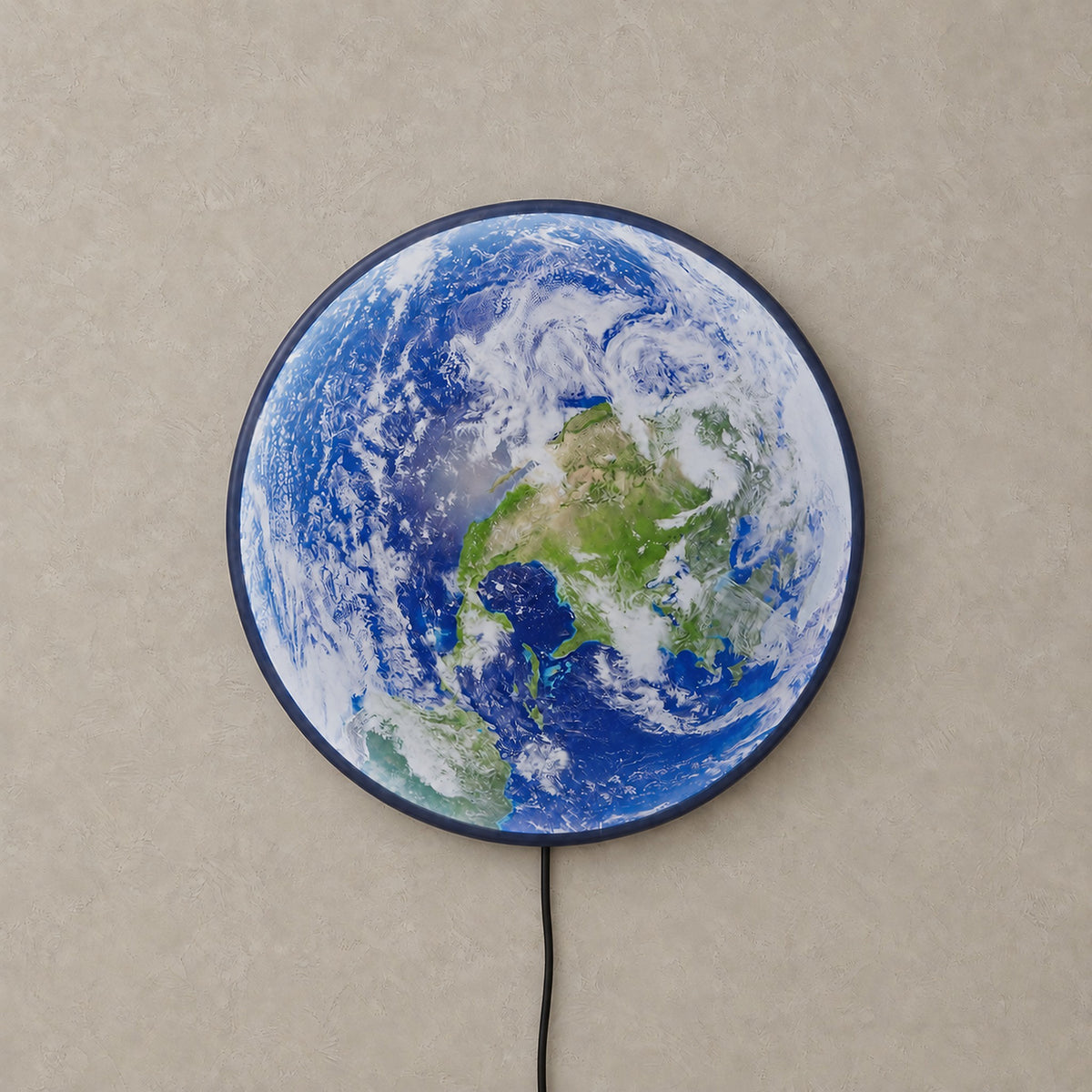 Tolanvi earth wall light in blue earth and dark rim, a round earth wall light shown unlit on a plain background