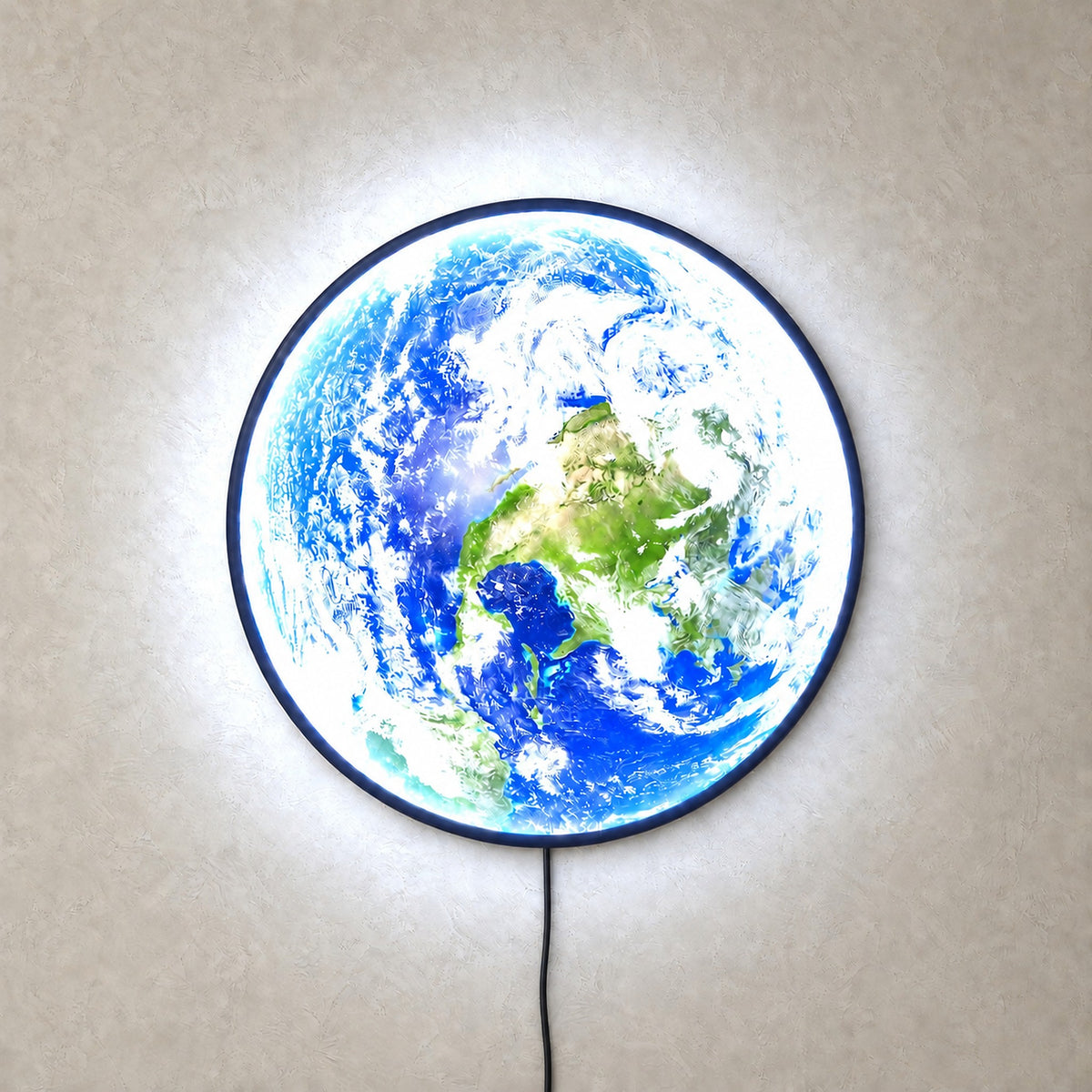 Tolanvi earth wall light in blue earth and dark rim, an LED wall sconce lit with cool white glowing clouds
