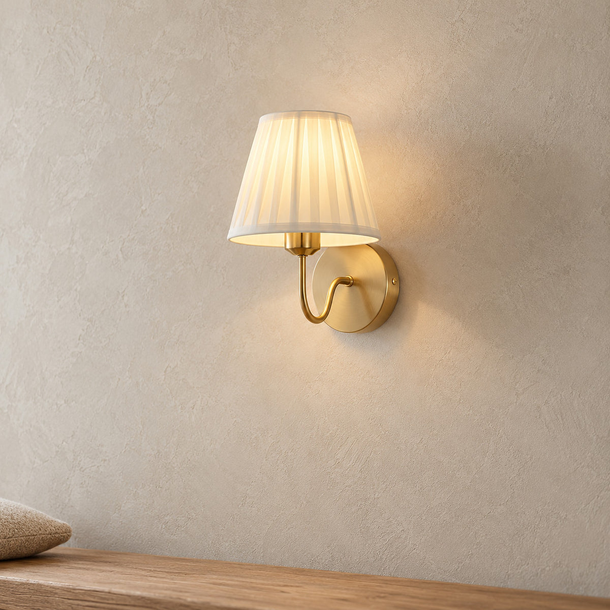 Tomirel gold wall light showing the round metal backplate and the open bottom of the fabric shade