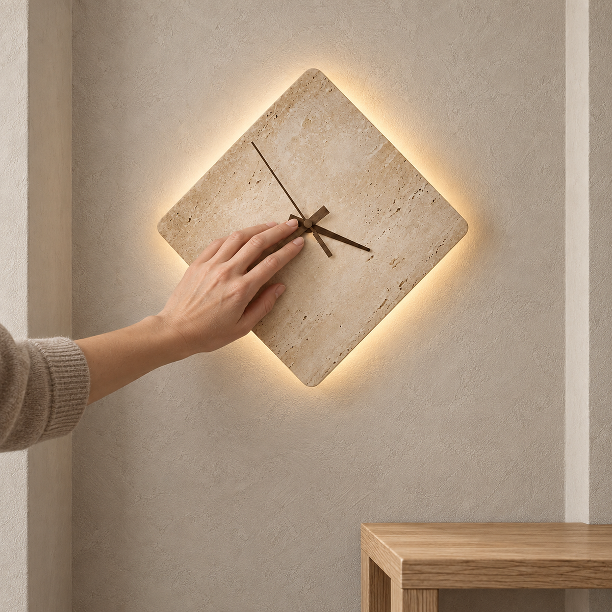 Toselmi yellow travertine wall sconce in the small 23 cm size lit on a narrow hallway wall above a console