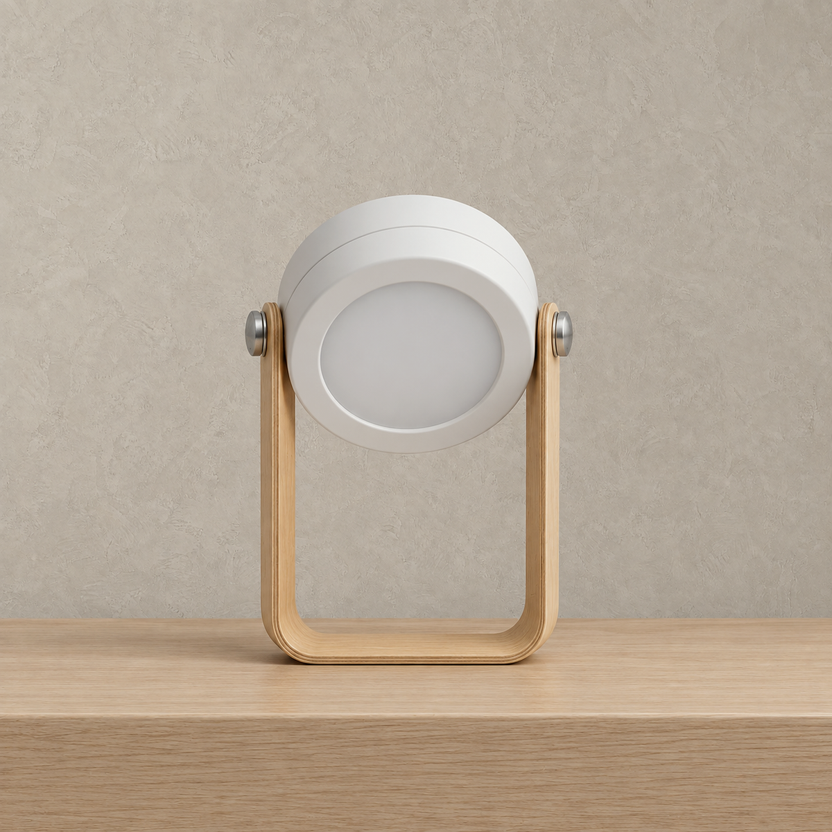 Tovalio white wireless wall sconce standing compact and unlit on a pale surface